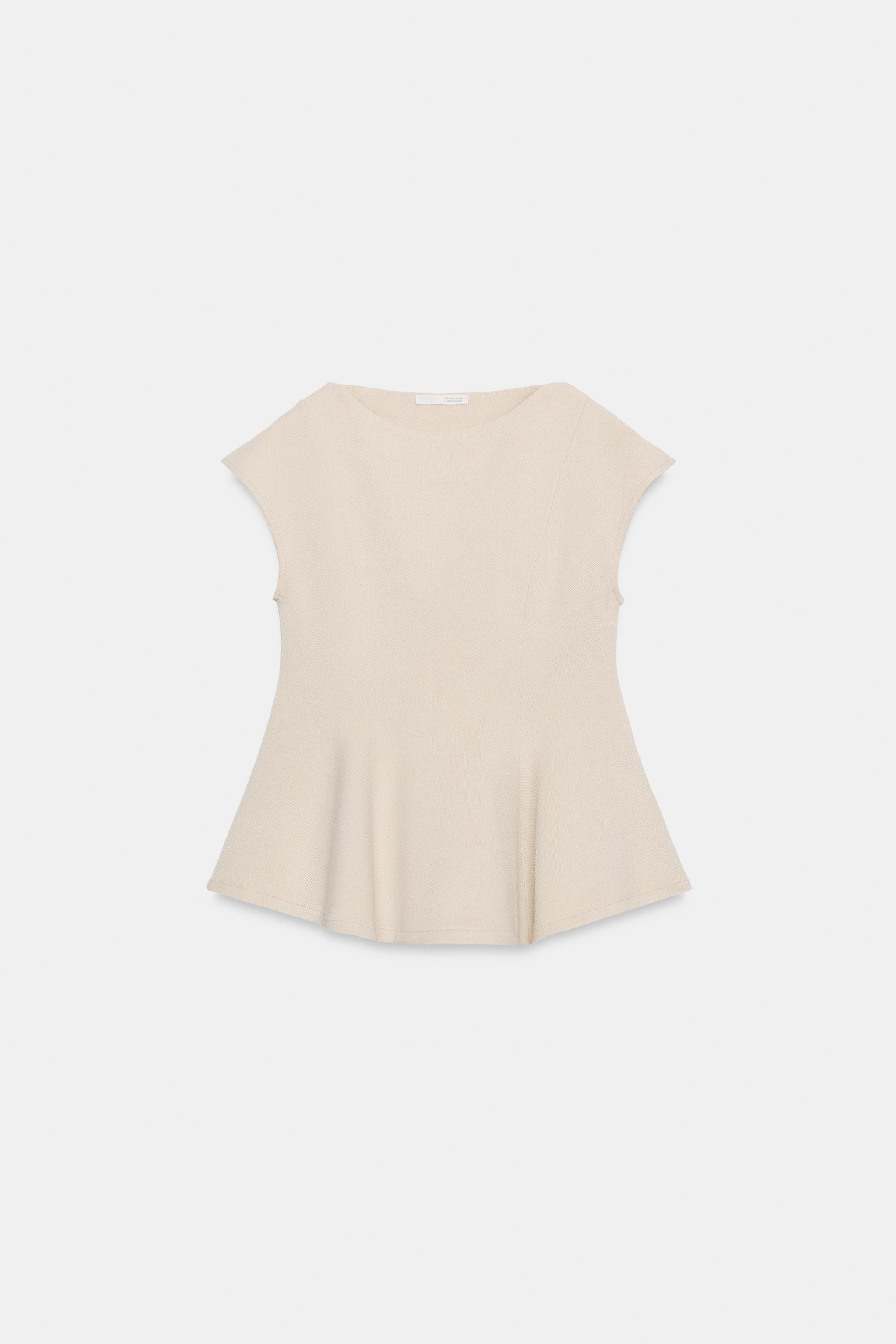SHORT SLEEVE PIQUÉ PEPLUM TOP